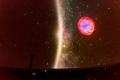 Studio radiowe wraz z publicznością w Planetarium Śląskim. 